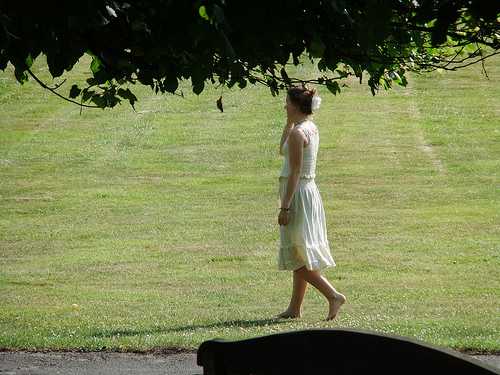woman barefoot on grass