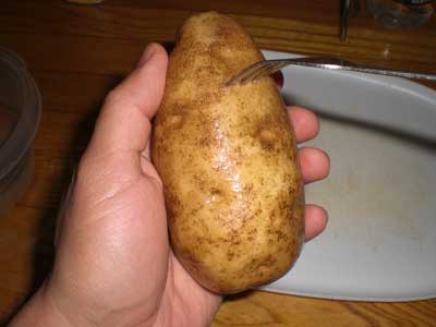 potato with a fork in it